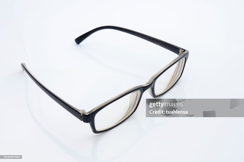 High Angle View Of Eyeglasses On Gray Background
