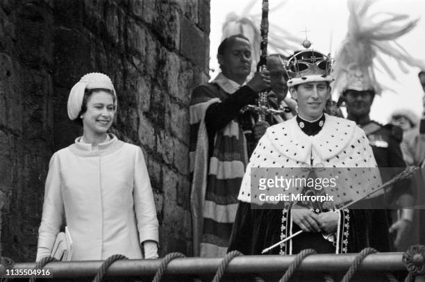 The Investiture of Prince Charles at Caernarfon Castle, Caernarfon, Wales, Pictured, Prince Charles, newly installed as Prince of Wales, is presented...