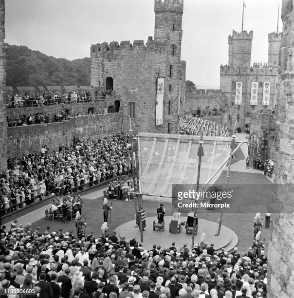 The Investiture of Prince Charles at Caernarfon Castle, Caernarfon, Wales, At the centre is the royal dais with its perspex canopy and circular...