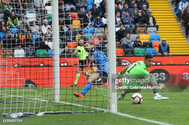 Francesco Caputo of Empoli FC scores the opening goal during the Serie A match between Udinese and Empoli at Stadio Friuli on April 7, 2019 in Udine,...