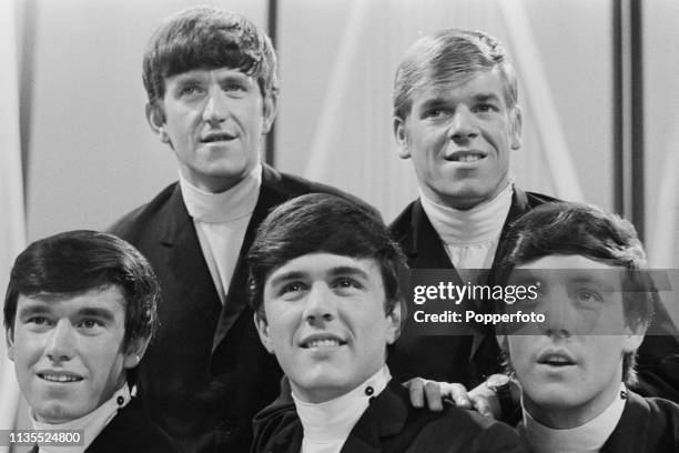 English pop group The Dave Clark Five posed together in England in February 1964. Members of the band are, from left, Denis Payton, Rick Huxley, Dave...