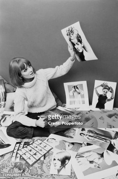 Welsh model Grace Coddington pictured looking at photographic prints from modelling shoots in London in February 1964. Grace Coddington has...