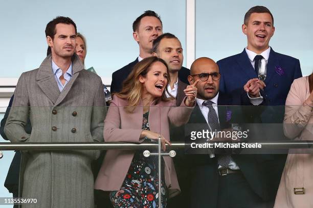 Andy Murray and his wife Kim Murray look on during the opening race on Ladies Day of the Cheltenham Festival at Cheltenham Racecourse on March 13,...