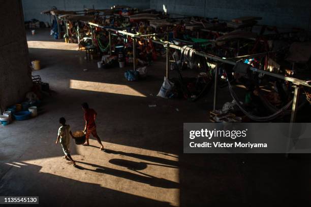 Members of the Venezuelan indigenous group Warao take refuge at the Janokoida UN shelter on April 6, 2019 in Pacaraima, Brazil. Venezuelan refugees...