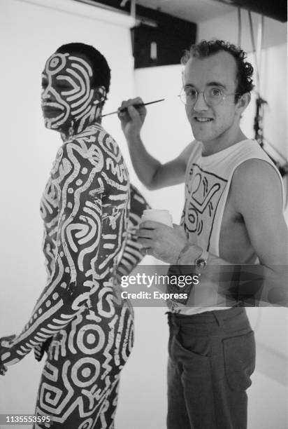 American artist Keith Haring body painting American choreographer, director, author and dancer Bill T Jones before a photo shoot with American artist...