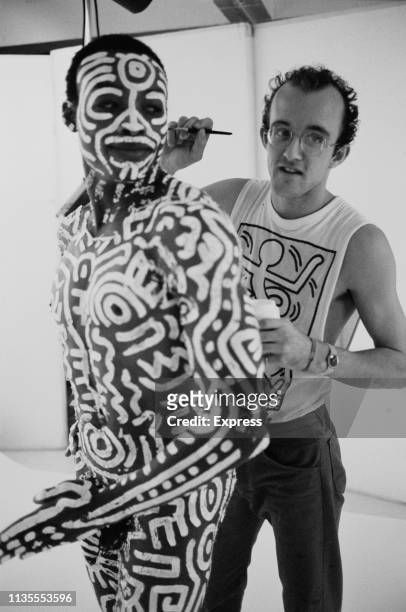 American artist Keith Haring body painting American choreographer, director, author and dancer Bill T Jones before a photo shoot with American artist...
