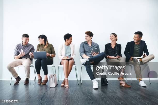 toekomstige collega's in de maak - people in a row stockfoto's en -beelden