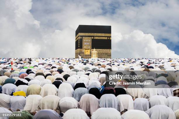 people praying in mecca - hajj ストックフォトと画像