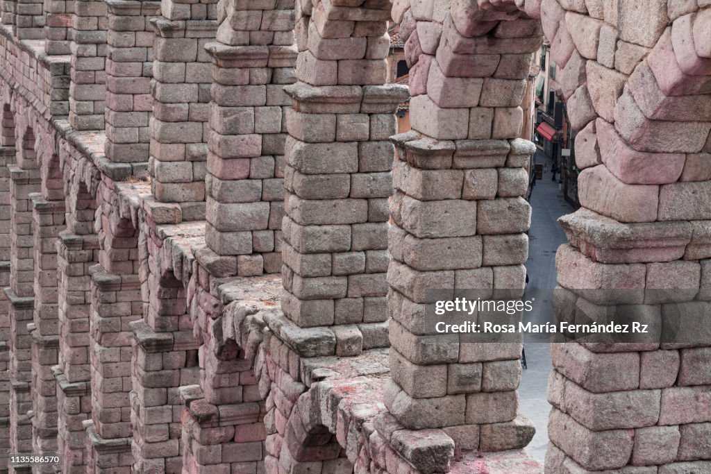 View of ancient roman architecture of The roman Aqueduct of Segovia, Castilla y Leon, Spain