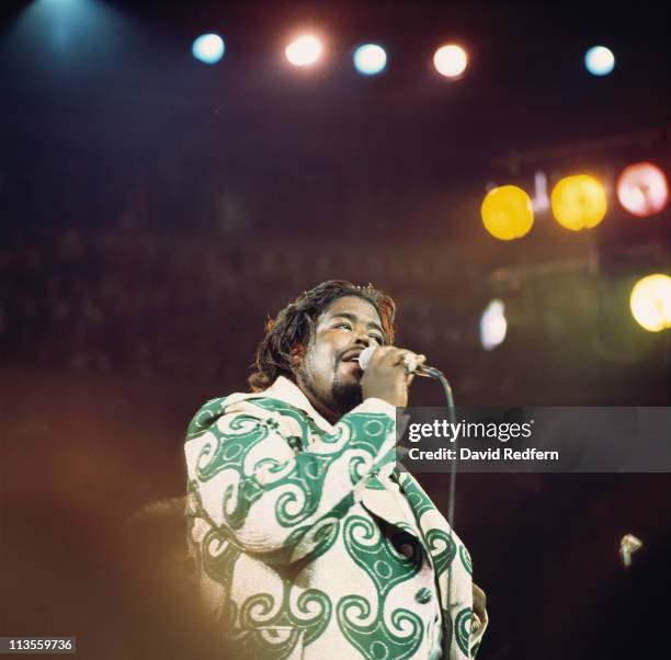 Barry White , U.S. Soul singer, singing into a microphone during a live concert performance at the Royal Albert Hall, London, England, Great Britain,...