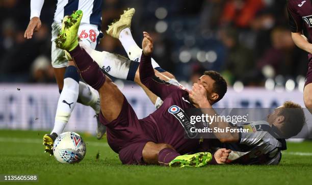 Player Craig Dawson gets to grips with Wayne Routledge of Swansea during the Sky Bet Championship match between West Bromwich Albion and Swansea City...