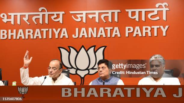 Union Finance Minister Arun Jaitley, Union Railways Minister Piyush Goyal and BJP leader Bhupender Yadav during the launch of the party's election...