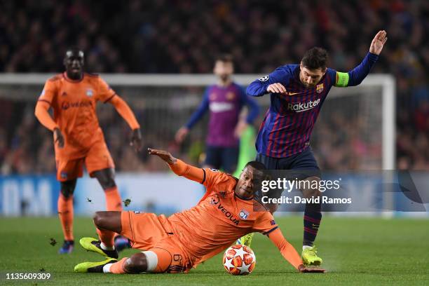 Lionel Messi of Barcelona evades Marcelo of Olympique Lyonnais during the UEFA Champions League Round of 16 Second Leg match between FC Barcelona and...
