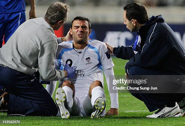 Bruno Cazarine of Sydney FC injured during the Group H AFC Champions League match between Suwon Samsung Bluewings and the Sydney FC at Suwon World...