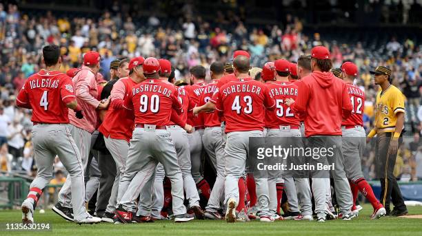 Benches clear after Chris Archer of the Pittsburgh Pirates throws behind Derek Dietrich of the Cincinnati Reds in the fourth inning during the game...
