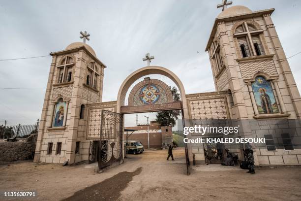 This picture taken on April 6, 2019 shows a view of the gatehouse of the Coptic Orthodox "White Monastery" of St Shenouda the Archimandrite in...