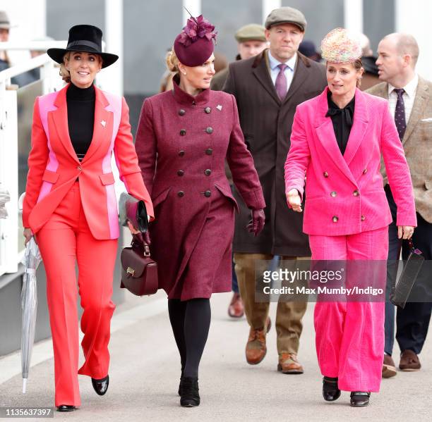 Chanelle McCoy, Zara Tindall and Dolly Maude attend day 2 'Ladies Day' of the Cheltenham Festival at Cheltenham Racecourse on March 13, 2019 in...