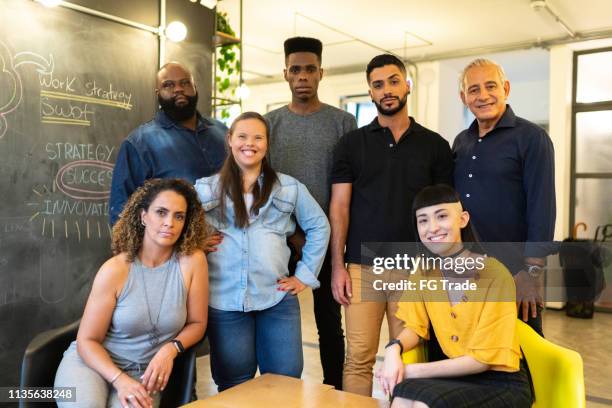 portrait of team at modern office - diversity workplace stock pictures, royalty-free photos & images