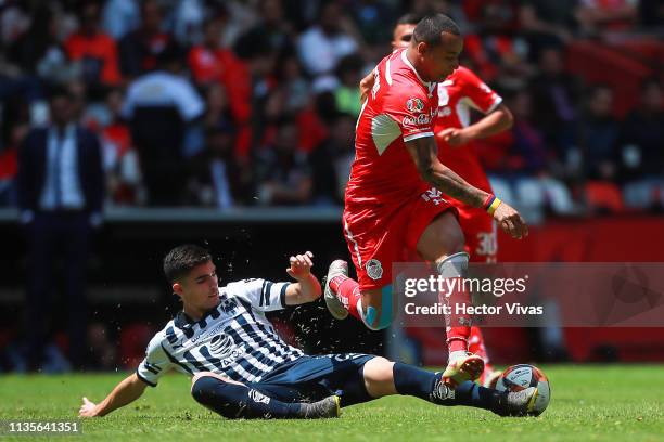 Johan Vasquez of Monterrey struggles for the ball with Edgar Pardo of Toluca during the 13th round match between Toluca and Monterrey as part of the...