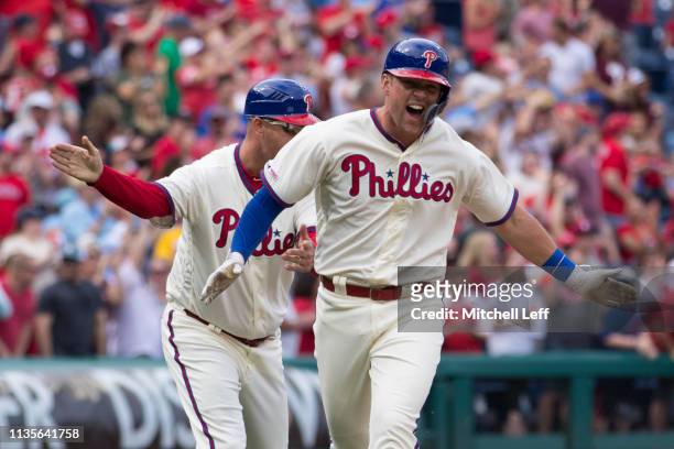 Rhys Hoskins of the Philadelphia Phillies reacts after hitting a two run home run in the bottom of the sixth inning against the Minnesota Twins at...