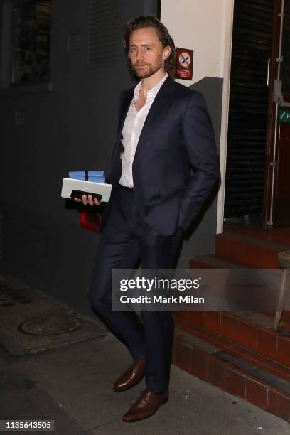 Tom Hiddleston leaving the Harold Pinter Theatre after his performance in Betrayal on March 13, 2019 in London, England.