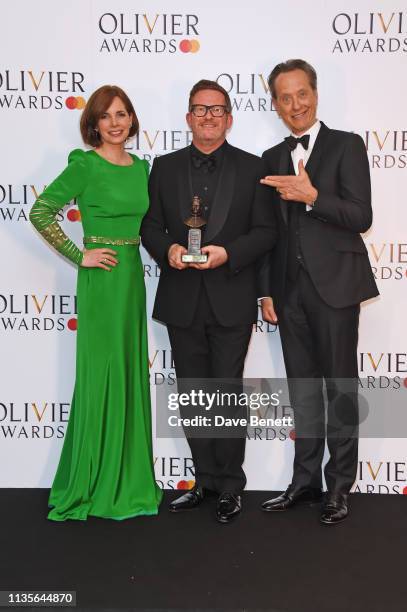 Dame Darcey Bussell, Sir Matthew Bourne, winner of the Special Award, and Richard E. Grant pose in the press room at The Olivier Awards 2019 with...