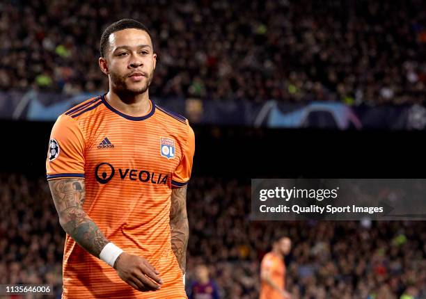 Memphis Depay of Olympique Lyonnais reacts during the UEFA Champions League Round of 16 Second Leg match between FC Barcelona and Olympique Lyonnais...