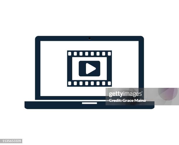 laptop computer with video or movie play button icon - computer play button icon stock illustrations