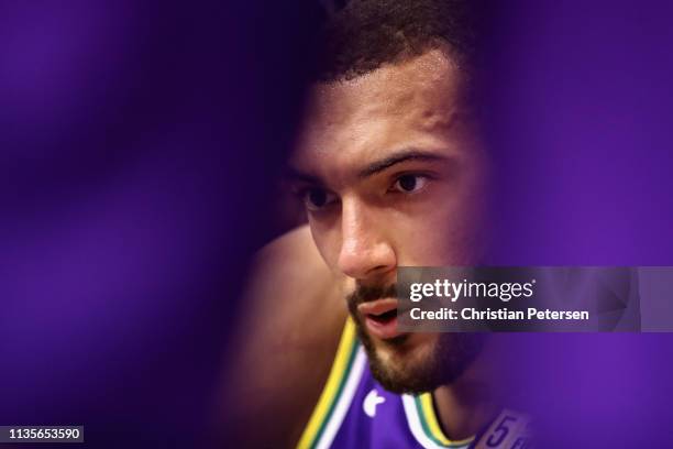 Rudy Gobert of the Utah Jazz sits on the bench during a time-out against the Phoenix Suns the first half of the NBA game at Talking Stick Resort...