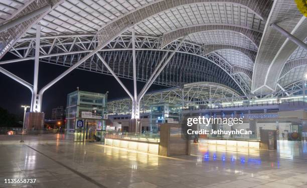 new railway station in taichung at night - taichung stockfoto's en -beelden