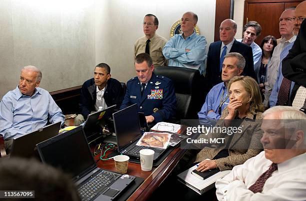 President Barack Obama and Vice President Joe Biden, along with with members of the national security team, receive an update on the mission against...