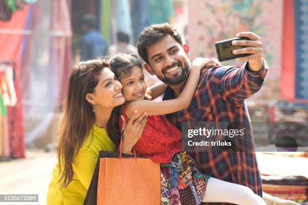 indian family taking selfie - indian art culture and entertainment stock pictures, royalty-free photos & images