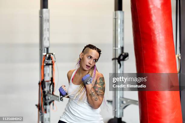 curvy woman in the gym - fat boxer stock pictures, royalty-free photos & images
