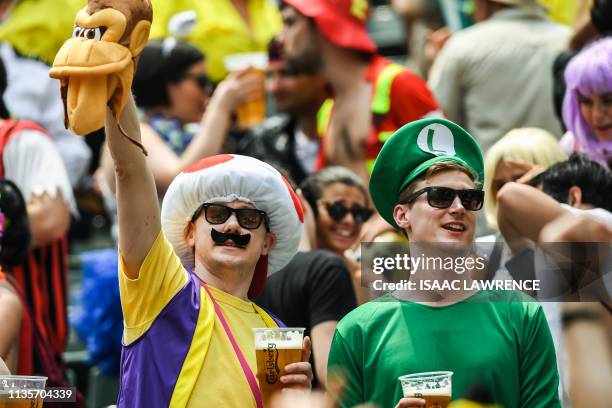 This picture taken on April 6 shows fans attending the second day of the Hong Kong Sevens rugby tournament. - The Hong Kong Sevens will soon bid...