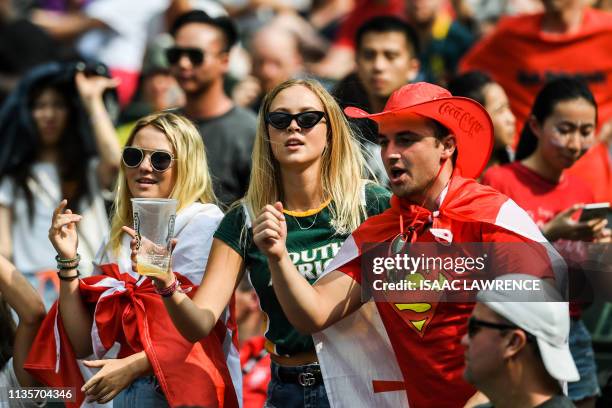 This picture taken on April 7 shows fans attending the third day of the Hong Kong Sevens rugby tournament. - The Hong Kong Sevens will soon bid...