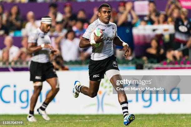 Aminiasi Tuimaba of Fiji runs for scoring his goal during the day three of the Cathay Pacific/HSBC Hong Kong Sevens Cup Final match between Fiji and...