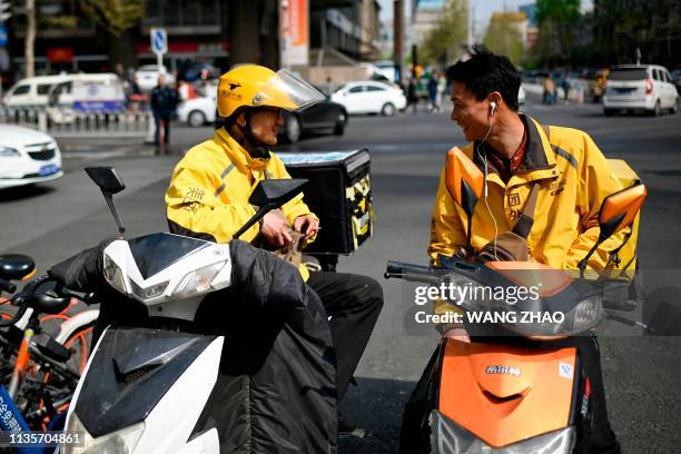 Chinese Delivery Riders 264 China Delivery Scooter Stock Photos, High-Res Pictures, and Images ...