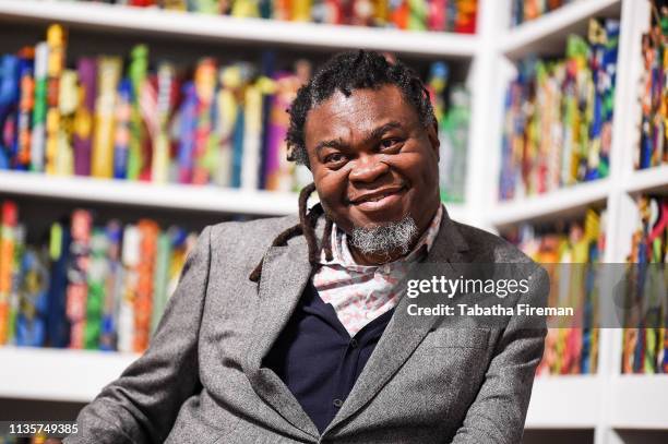 Yinka Shonibare ahead of the opening of his installation "The British Library" at Tate Modern on April 8, 2019 in London, England.