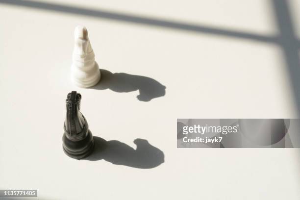 facing each other - chess championship stock pictures, royalty-free photos & images