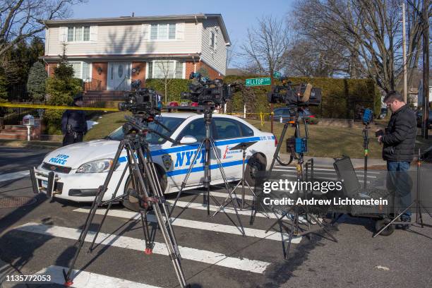 Police watch over the crime scene of the home of alleged Gambino family mafia crime boss Frank Cali on March 14, 2019 in the Todt Hill neighborhood...