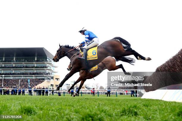 Jockey Bryony Frost on her way to victory as she rides Frodon during the Ryanair Chase race during St Patrick's Thursday at Cheltenham Racecourse on...