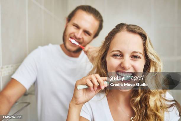 ready to start the day with fresh breath - husband cleaning stock pictures, royalty-free photos & images