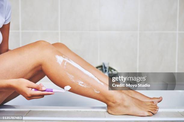 making sure she has silky smooth legs - leg stock pictures, royalty-free photos & images