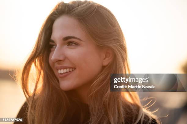 headshot of an attractive model looking away - candid beautiful young woman face stock pictures, royalty-free photos & images