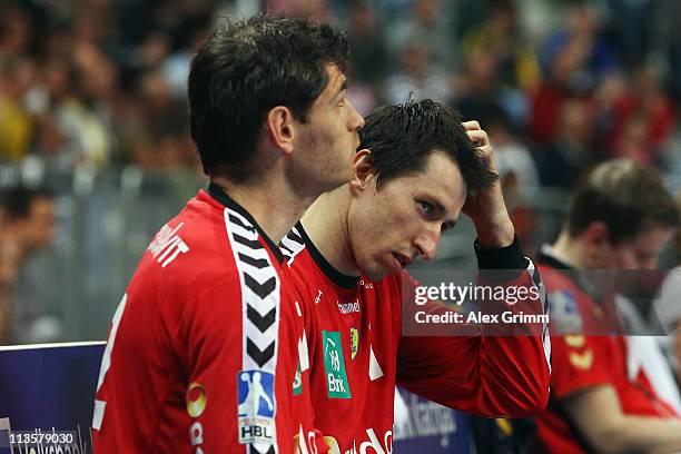 Goalkeepers Henning Fritz and Slawomir Szmal of Rhein-Neckar Loewen react during the Toyota Handball Bundesliga match between Rhein Neckar Loewen and...