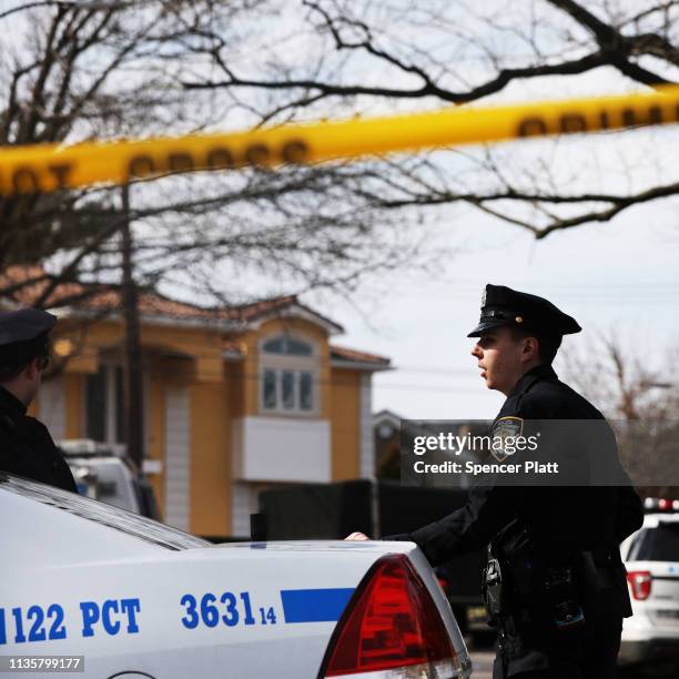 Police stand near where reputed mob boss Francesco “Franky Boy” Cali lived and was gunned down on March 14, 2019 in the Todt Hill neighborhood of the...