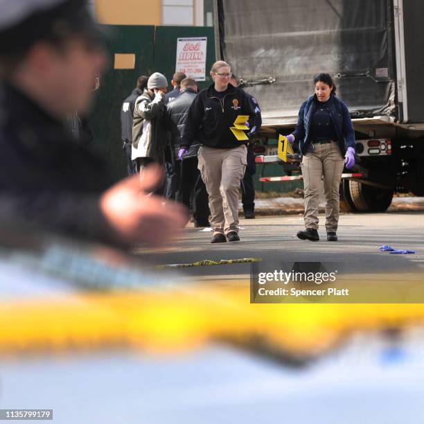 Police stand near where reputed mob boss Francesco “Franky Boy” Cali lived and was gunned down on March 14, 2019 in the Todt Hill neighborhood of the...