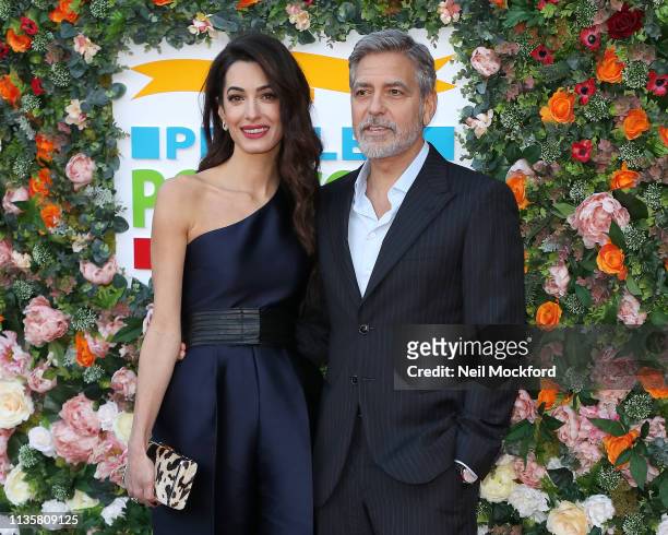 George Clooney and Amal Clooney attend the People's Postcode Lottery Charity Gala at McEwan Hall on March 14, 2019 in Edinburgh, Scotland.