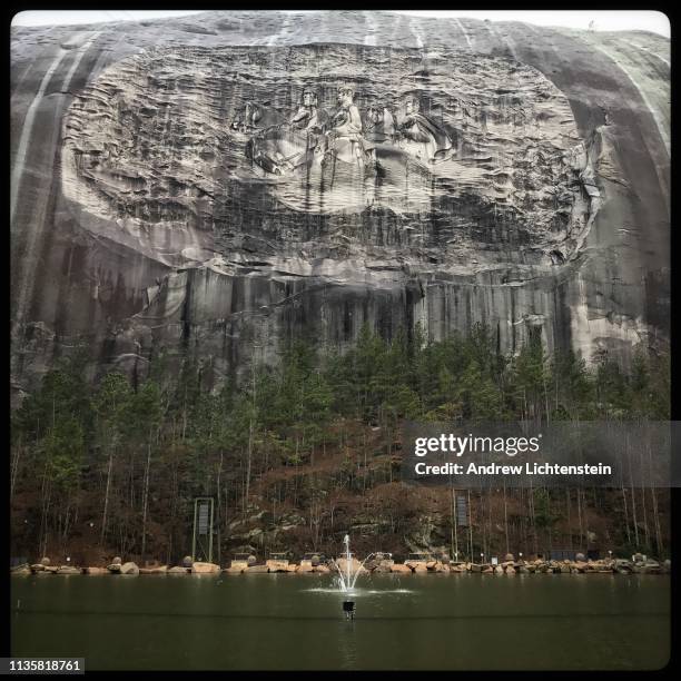 Giant rock face has images of three Confederate generals carved in it as a tribute to cause of the Southern army during the Civil War, as seen on...