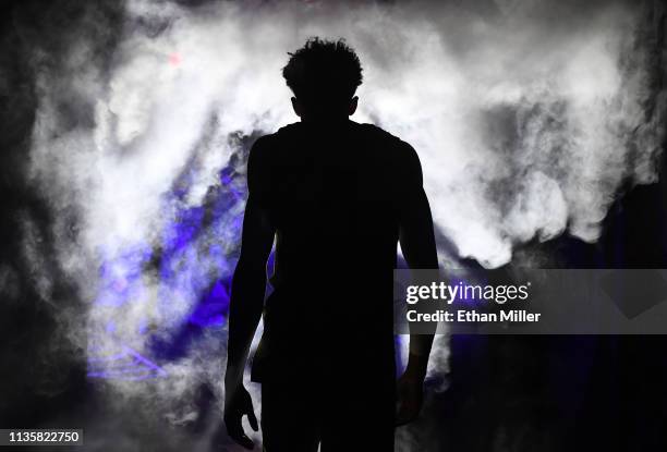 Matisse Thybulle of the Washington Huskies is introduced before a quarterfinal game of the Pac-12 basketball tournament against the USC Trojans at...